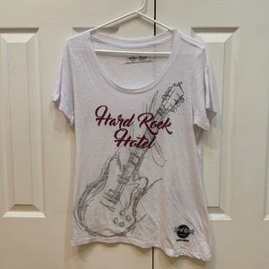 Hard Rock Hotel T-shirt. White with pink bling on front. Size large.